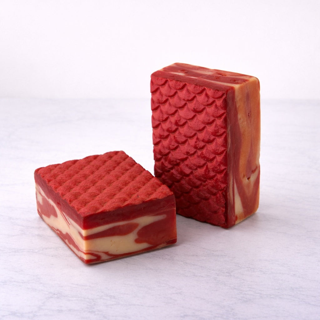 Two bars of dark pink mermeat soap